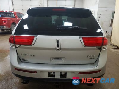 Zdjęcie 6 z 14 samochodu: 2013 LINCOLN MKX VIN:2LMDJ8JK6DBL17380 - miniatura
