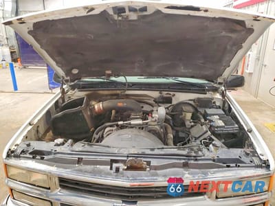 Zdjęcie 12 z 13 samochodu: 1999 CHEVROLET TAHOE K1500 VIN:1GNEK13R6XJ355699 - miniatura