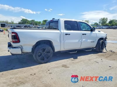Trzecie zdjęcie samochodu z tyłu: 2024 RAM 1500 BIG HORN VIN:1C6SRFFT1RN210844 - miniatura