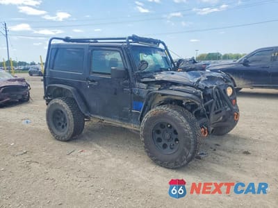 Czwarte zdjęcie samochodu z boku: 2012 JEEP WRANGLER SPORT VIN:1C4AJWAG9CL256351 - miniatura
