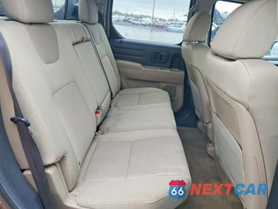 Zdjęcie 10 z 12 samochodu: 2010 HONDA RIDGELINE RTS VIN:5FPYK1F43AB010318 - miniatura