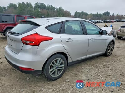 Trzecie zdjęcie samochodu z tyłu: 2017 FORD FOCUS SE VIN:1FADP3K26HL215749 - miniatura