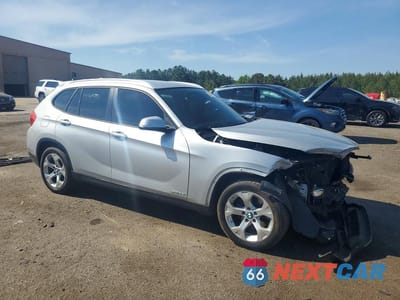 Czwarte zdjęcie samochodu z boku: 2014 BMW X1 SDRIVE28I VIN:WBAVM1C57EVW52967 - miniatura