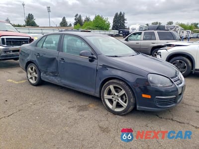 Czwarte zdjęcie samochodu z boku: 2009 VOLKSWAGEN JETTA S VIN:3VWJZ71K19M154288 - miniatura