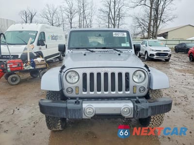 Piąte zdjęcie samochodu w środku: 2017 JEEP WRANGLER UNLIMITED SAHARA VIN:1C4BJWEG0HL540294 - miniatura