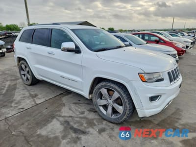 Czwarte zdjęcie samochodu z boku: 2015 JEEP GRAND CHEROKEE OVERLAND VIN:1C4RJFCM0FC618612 - miniatura