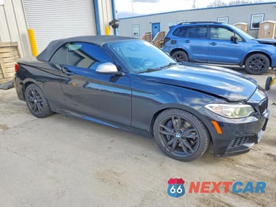 Czwarte zdjęcie samochodu z boku: 2016 BMW M235XI VIN:WBA1M5C54GV327489 - miniatura