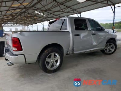Trzecie zdjęcie samochodu z tyłu: 2012 DODGE RAM 1500 ST VIN:1C6RD6KT4CS332111 - miniatura
