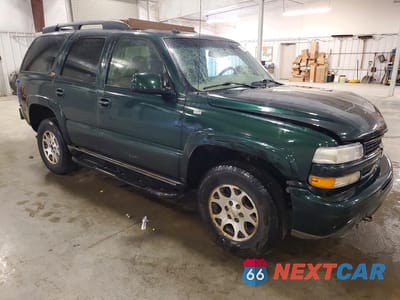 Czwarte zdjęcie samochodu z boku: 2003 CHEVROLET TAHOE K1500 VIN:1GNEK13Z93R192073 - miniatura