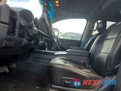 Zdjęcie 7 z 12 samochodu: 2013 NISSAN TITAN SV VIN:1N6AA0EC3DN307303 - miniatura