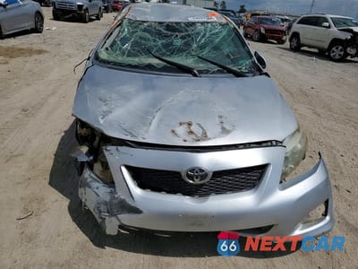 Piąte zdjęcie samochodu w środku: 2010 TOYOTA COROLLA LE VIN:1NXBU4EE4AZ333476 - miniatura