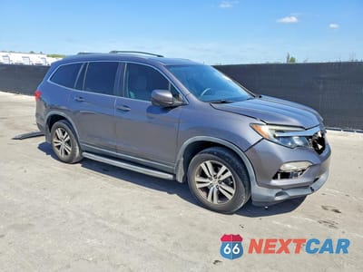 Czwarte zdjęcie samochodu z boku: 2016 HONDA PILOT EXL VIN:5FNYF6H59GB106320 - miniatura
