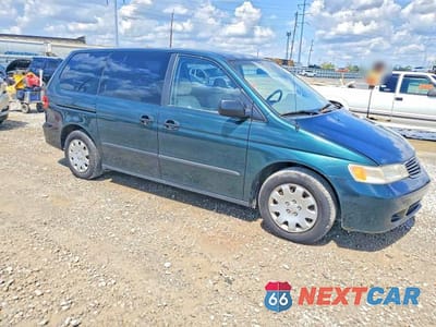 Czwarte zdjęcie samochodu z boku: 2000 HONDA ODYSSEY VIN:2HKRL1852YH500843 - miniatura