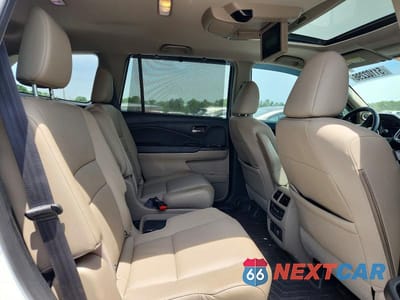 Zdjęcie 11 z 13 samochodu: 2022 HONDA PILOT TOURING VIN:5FNYF5H61NB020077 - miniatura