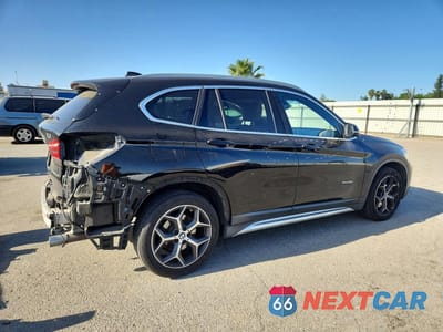 Trzecie zdjęcie samochodu z tyłu: 2017 BMW X1 SDRIVE28I VIN:WBXHU7C30H5H38374 - miniatura
