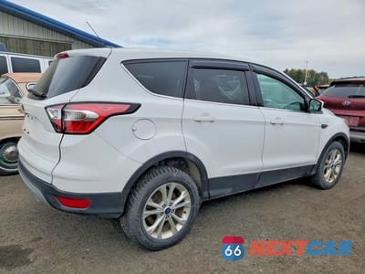 Trzecie zdjęcie samochodu z tyłu: 2017 FORD ESCAPE SE VIN:1FMCU9GDXHUD43672 - miniatura