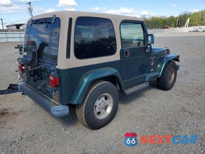 Trzecie zdjęcie samochodu z tyłu: 2000 JEEP WRANGLER / TJ SAHARA VIN:1J4FA59S6YP801649 - miniatura