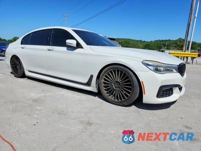 Czwarte zdjęcie samochodu z boku: 2016 BMW 750 XI VIN:WBA7F2C50GG416256 - miniatura