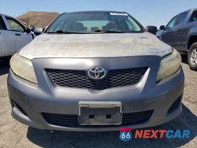 Piąte zdjęcie samochodu w środku: 2010 TOYOTA COROLLA LE VIN:1NXBU4EE6AZ311169 - miniatura