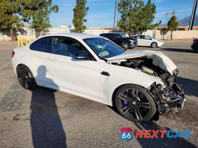 Czwarte zdjęcie samochodu z boku: 2017 BMW M2 VIN:WBS1H9C33HV887897 - miniatura