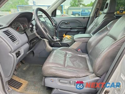 Zdjęcie 7 z 13 samochodu: 2004 HONDA PILOT EXL VIN:2HKYF18764H603181 - miniatura
