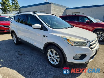 Czwarte zdjęcie samochodu z boku: 2018 FORD ESCAPE SEL VIN:1FMCU0HD1JUA42367 - miniatura