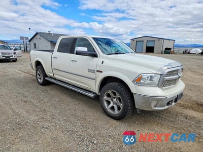 Czwarte zdjęcie samochodu z boku: 2016 RAM 1500 LARAMIE VIN:1C6RR7VM2GS215127 - miniatura