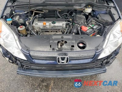 Zdjęcie 12 z 12 samochodu: 2009 HONDA CR-V LX VIN:5J6RE383X9L002532 - miniatura