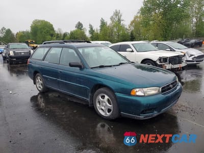 Czwarte zdjęcie samochodu z boku: 1999 SUBARU LEGACY L VIN:4S3BK4351X7310001 - miniatura