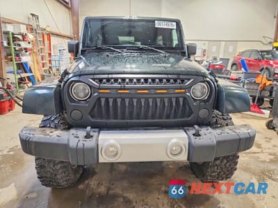 Piąte zdjęcie samochodu w środku: 2011 JEEP WRANGLER UNLIMITED SAHARA VIN:1J4BA5H16BL620752 - miniatura