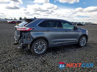 Trzecie zdjęcie samochodu z tyłu: 2022 FORD EDGE TITANIUM VIN:2FMPK4K96NBA77260 - miniatura