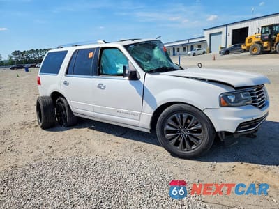 Czwarte zdjęcie samochodu z boku: 2015 LINCOLN NAVIGATOR VIN:5LMJJ2HT6FEJ01611 - miniatura