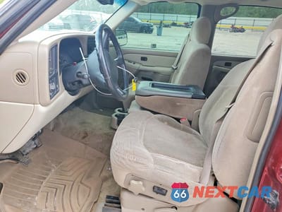 Zdjęcie 7 z 13 samochodu: 2002 CHEVROLET SUBURBAN C1500 VIN:1GNEC16Z52J332111 - miniatura