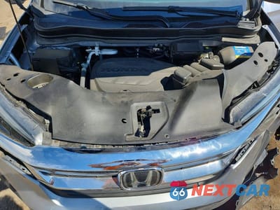 Zdjęcie 12 z 13 samochodu: 2021 HONDA PILOT EX VIN:5FNYF6H39MB049336 - miniatura