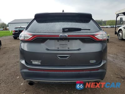 Zdjęcie 6 z 13 samochodu: 2015 FORD EDGE SEL VIN:2FMTK4J9XFBB19821 - miniatura