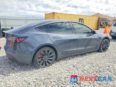 Trzecie zdjęcie samochodu z tyłu: 2023 TESLA MODEL 3 VIN:5YJ3E1EC7PF619200 - miniatura