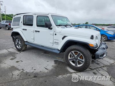Czwarte zdjęcie samochodu z boku: 2019 JEEP WRANGLER UNLIMITED SAHARA VIN:1C4HJXEN4KW679512 - miniatura
