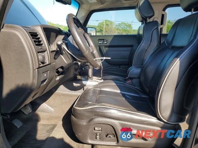 Zdjęcie 7 z 13 samochodu: 2006 HUMMER H3 VIN:5GTDN136268311277 - miniatura