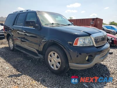 Czwarte zdjęcie samochodu z boku: 2003 LINCOLN NAVIGATOR VIN:5LMFU27R73LJ00851 - miniatura