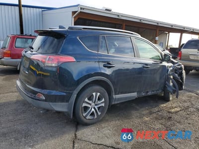 Trzecie zdjęcie samochodu z tyłu: 2018 TOYOTA RAV4 LE VIN:JTMBFREV3JJ255320 - miniatura