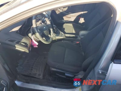 Zdjęcie 7 z 12 samochodu: 2017 FORD FOCUS SEL VIN:1FADP3H28HL258013 - miniatura