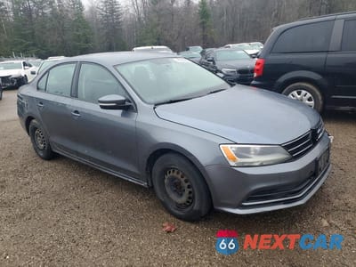 Czwarte zdjęcie samochodu z boku: 2016 VOLKSWAGEN JETTA S VIN:3VW267AJ0GM345363 - miniatura