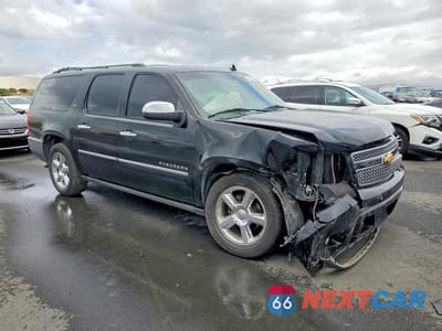 Czwarte zdjęcie samochodu z boku: 2013 CHEVROLET SUBURBAN C1500 LTZ VIN:1GNSCKE07DR367698 - miniatura