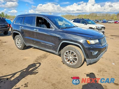 Czwarte zdjęcie samochodu z boku: 2014 JEEP GRAND CHEROKEE LIMITED VIN:1C4RJFBG1EC508940 - miniatura