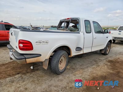 Trzecie zdjęcie samochodu z tyłu: 1997 FORD F150 VIN:1FTEX08L0VKC72396 - miniatura