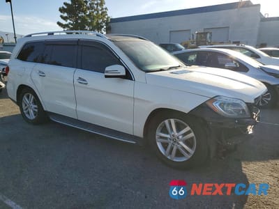 Czwarte zdjęcie samochodu z boku: 2013 MERCEDES-BENZ GL 450 4MATIC VIN:4JGDF7CE7DA196224 - miniatura
