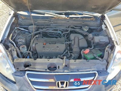 Zdjęcie 12 z 12 samochodu: 2006 HONDA CR-V VIN:JHLRD68556C025145 - miniatura