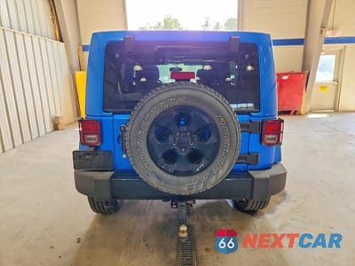 Zdjęcie 6 z 11 samochodu: 2015 JEEP WRANGLER UNLIMITED SAHARA VIN:1C4BJWEG8FL685189 - miniatura