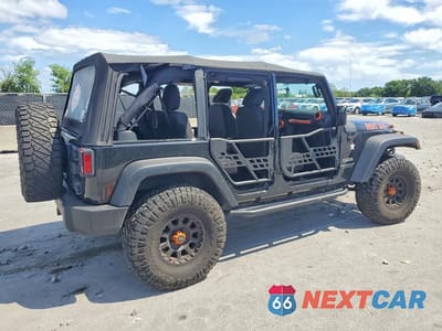 Trzecie zdjęcie samochodu z tyłu: 2016 JEEP WRANGLER UNLIMITED SPORT VIN:1C4BJWDG4GL255694 - miniatura