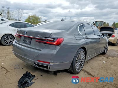 Trzecie zdjęcie samochodu z tyłu: 2020 BMW 750 XI VIN:WBA7U2C0XLGJ59515 - miniatura